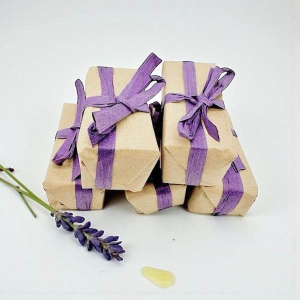 Stack of mini soothing raw honey soap infused with lavender and lime, beeswax and plant oils, calm, hydrating cleanse for mature or sensitive skin.