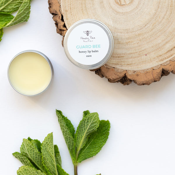 Nourishing peppermint lip balm with raw Welsh honey and beeswax, perfect for dry and sensitive lips.