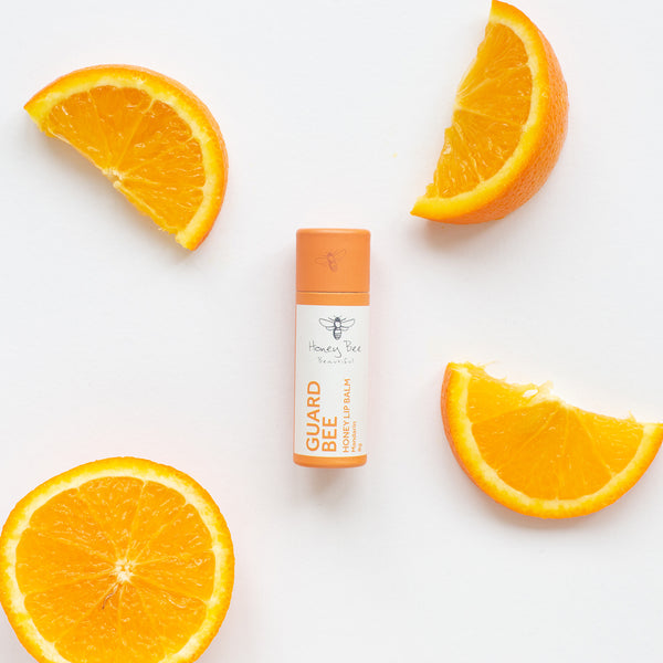 Nourishing mandarin lip balm with raw Welsh honey and beeswax, perfect for dry and sensitive lips.