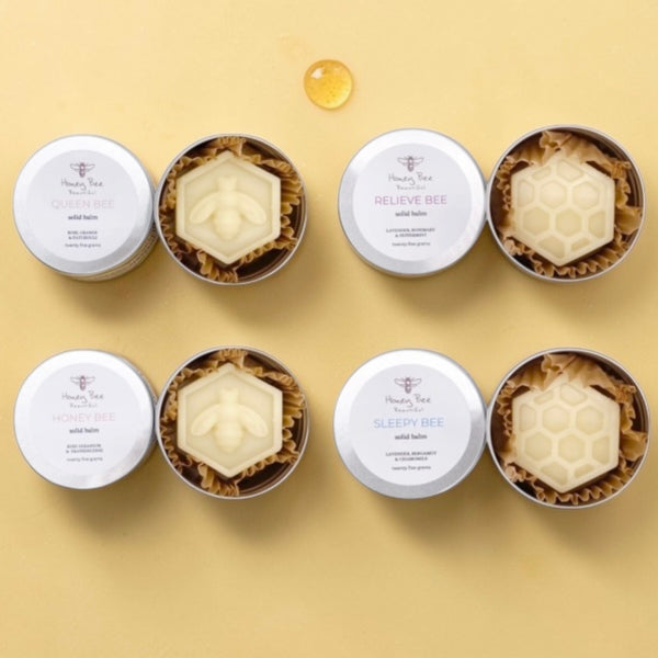 Raw honey and beeswax solid balm stack