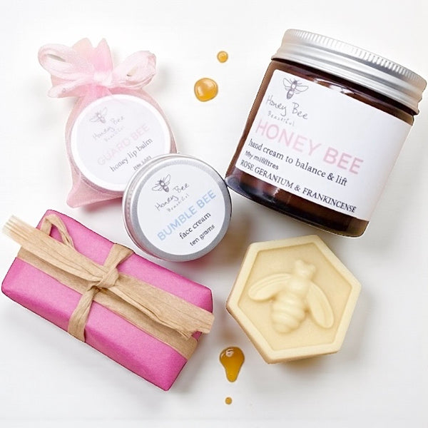 Rose-infused skincare set with raw Welsh honey and beeswax, designed for dry and maturing skin.