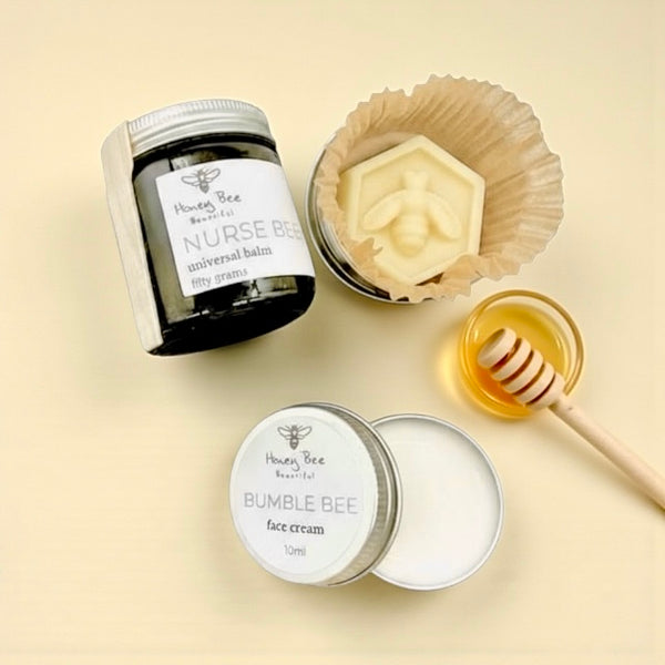Hydrating raw honey skincare trio including soothing balms and face cream perfect for women over 40 with dry, dry or hormonal skin needing deep moisture and glow.